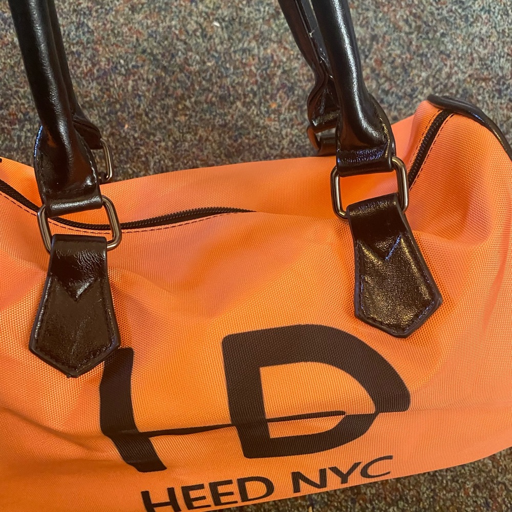 Brand new bag for sale. Orange. Heed nyc.